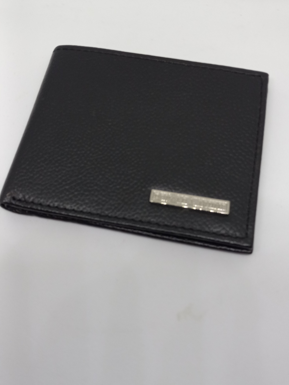 Donald J Trump Men's Black Leather Bi-Fold Wallet with Metal Accent